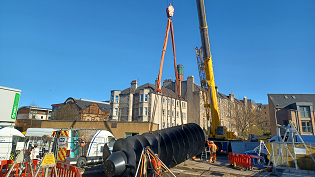 The screw pump is lowered into place at McDonald Road Pumping Station in Edinburgh