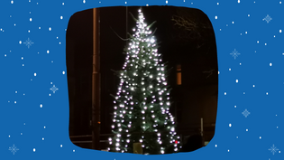 Image of Christmas tree surrounded by cartoon snow