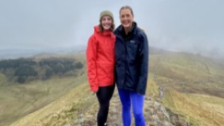 Sarah and Elle at the top of West Kip in the Pentlands