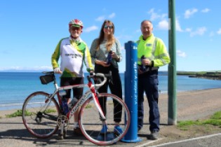 Locals celebrating Top Up Tap launch