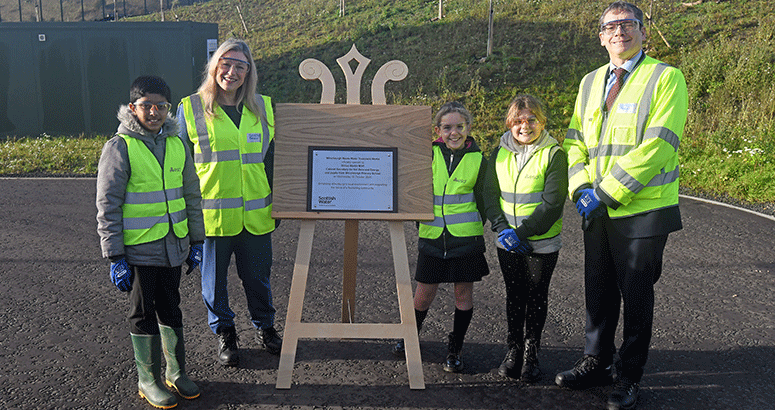 Pupils from Winchburgh Primary School unveiling a plaque to mark the opening of Winchburgh Waste Water Treatment Works with Cabinet  Secretary for Net Zero and Energy Gillian Martin and Scottish Water Chief  Executive Alex Plant
